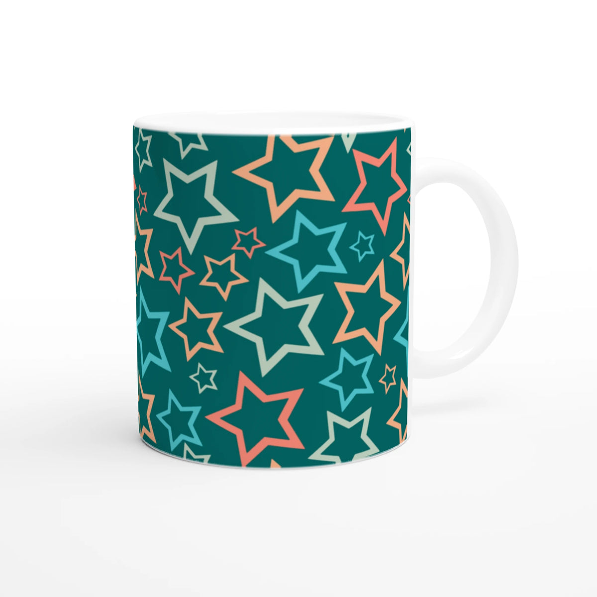 Retro multicolour star mug on teal background, a ceramic coffee cup in Y2K aesthetic.