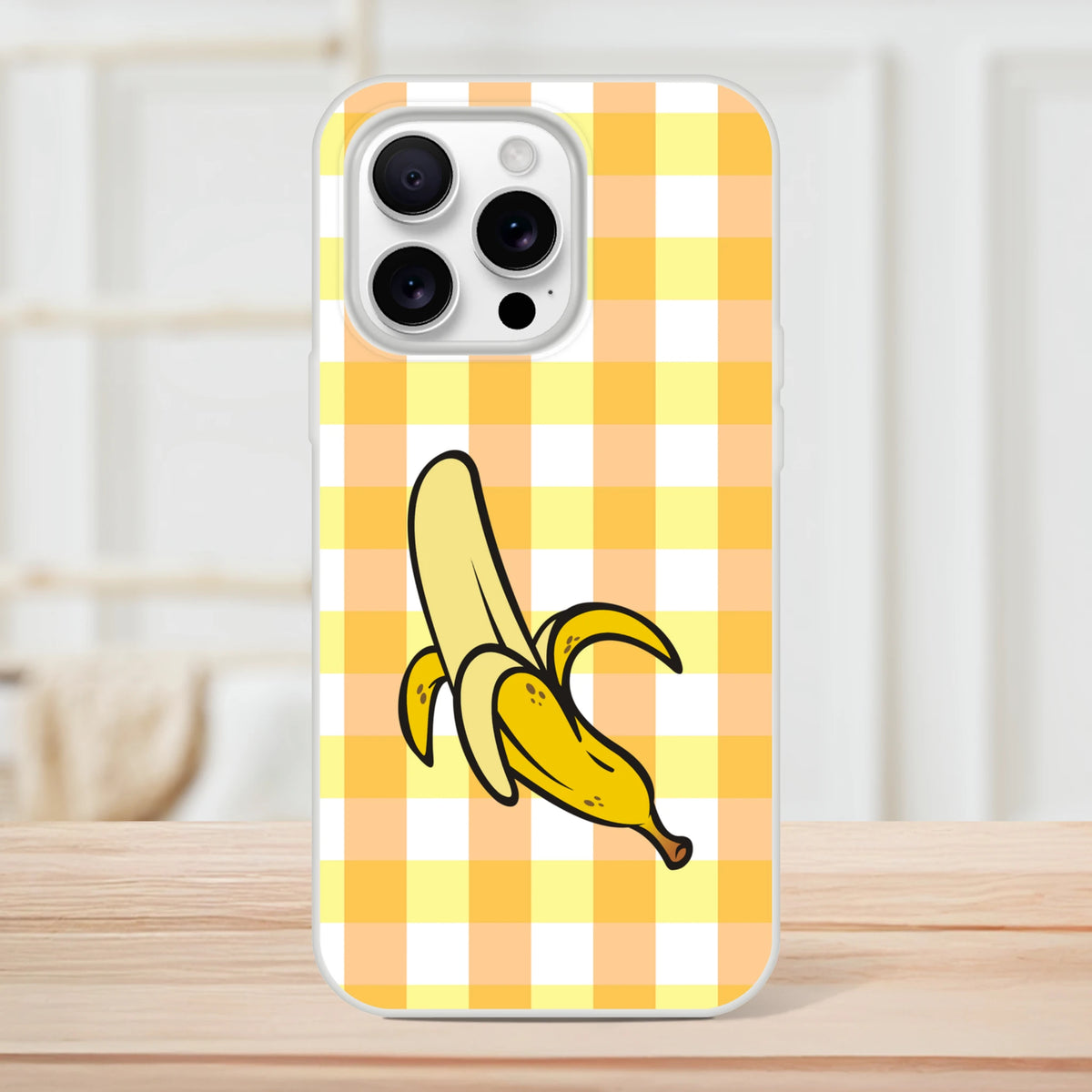 Banana-gingham yellow iPhone case for iPhone 13–16 featuring a bold banana graphic.