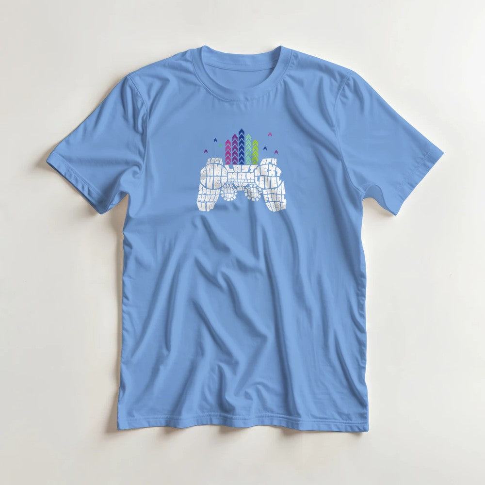 Light blue men's retro gamer graphic T-shirt with pixel-art controller and colorful arcade skyline.