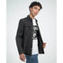 Male model wearing Trance Gorilla Graphic T-shirt in white under a black denim jacket.