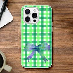 Green gingham bow iPhone case for 13–16 in a cute coquette aesthetic with frosty transparent TPU and printed bow.