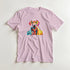 Pastel pink women's T-shirt with a bright, multicolored dog wearing glasses graphic in a soft cotton blend.