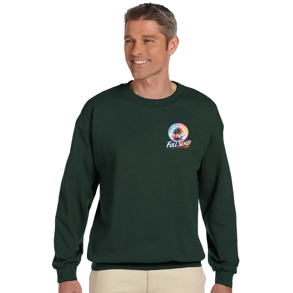 Man wearing dark green petrolhead graphic jumper with colorful Urban Palm Trees logo for a motorsport-inspired casual look.
