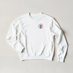 White crewneck sweatshirt featuring a colorful retro tropical palm tree logo on the chest for a cozy holiday vibe.