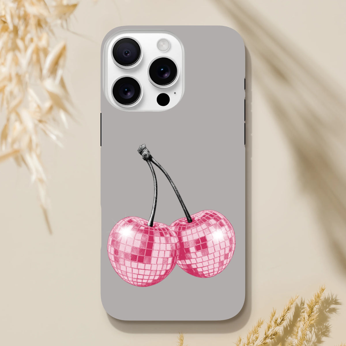 Gray iPhone case featuring pink disco ball cherry design, tough fruit phone cover for iPhone 13-16.
