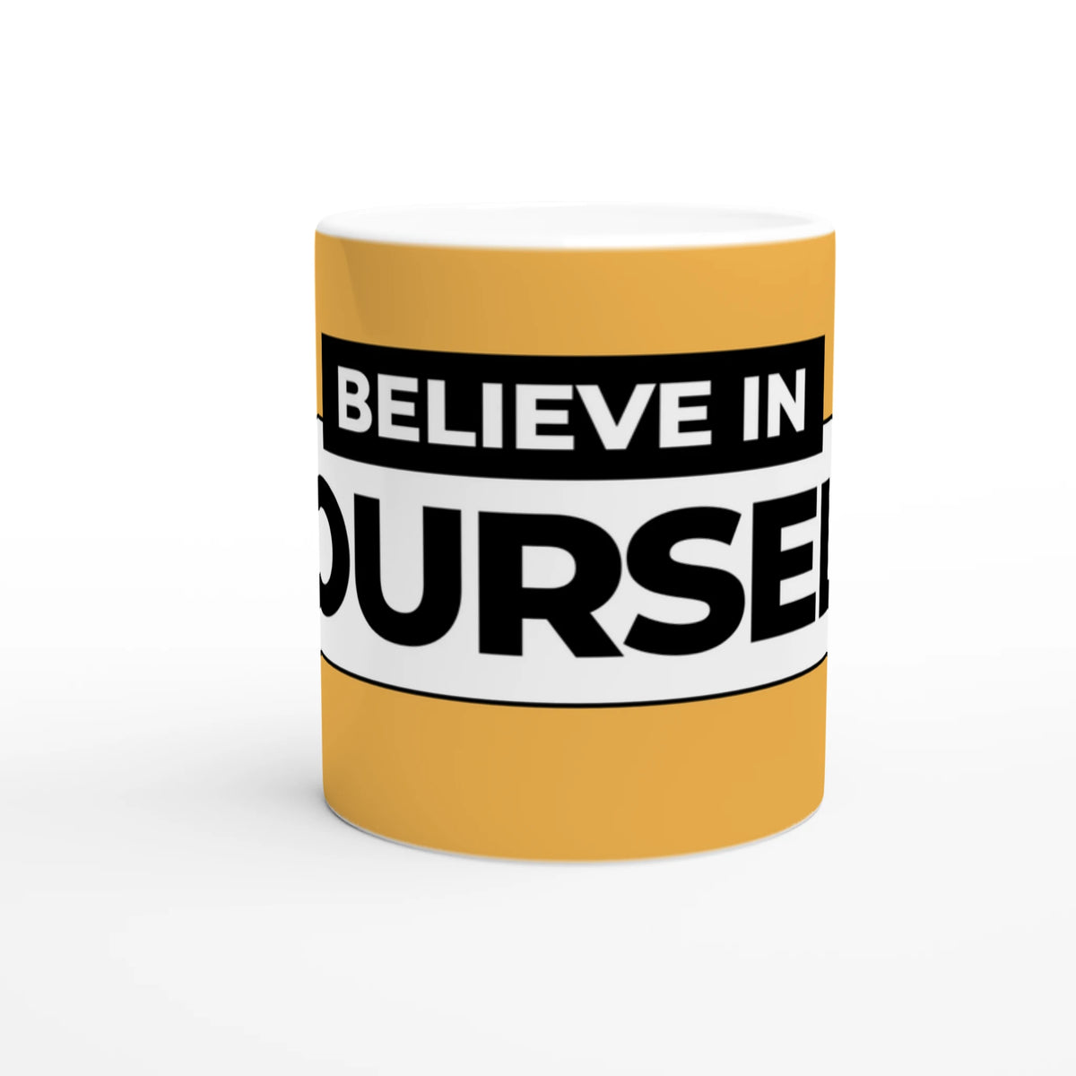 Yellow ceramic mug with wraparound black-and-white Believe In Yourself slogan.