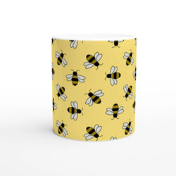 Yellow ceramic mug with a cute bee pattern for bee lovers.