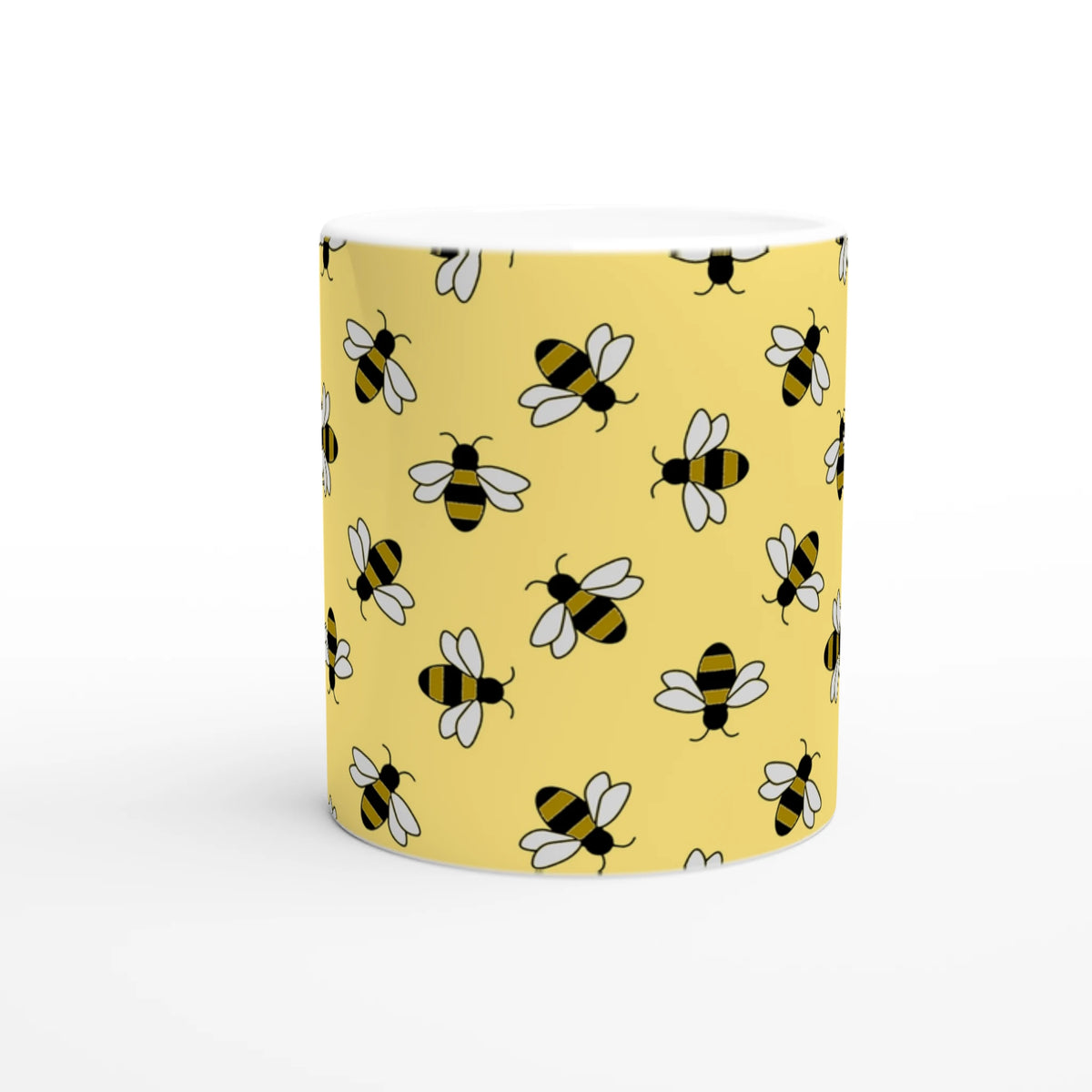Yellow ceramic mug with a cute bee pattern for bee lovers.