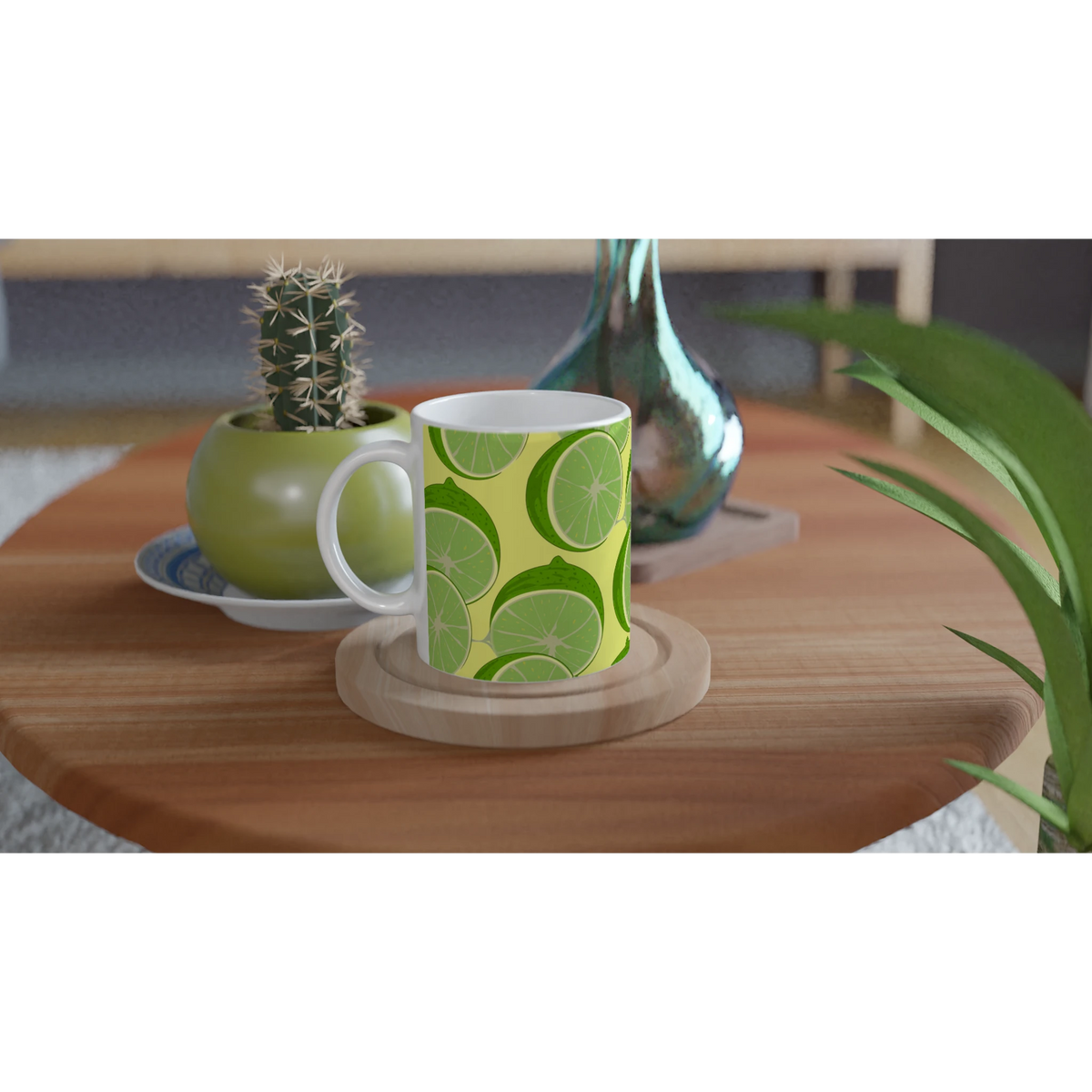 Lime Slice Pattern Ceramic Mug - Citrus Coffee Cup with lime designs on a wooden table beside a cactus planter.