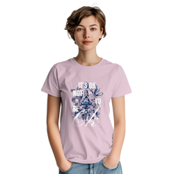 Woman wearing pale pink cotton-blend tee with blue floral graphic and It's OK Not To Be OK slogan.