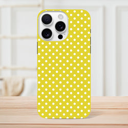 Yellow and white polka dot tough iPhone case providing impact-absorbing protection for models 13-16.