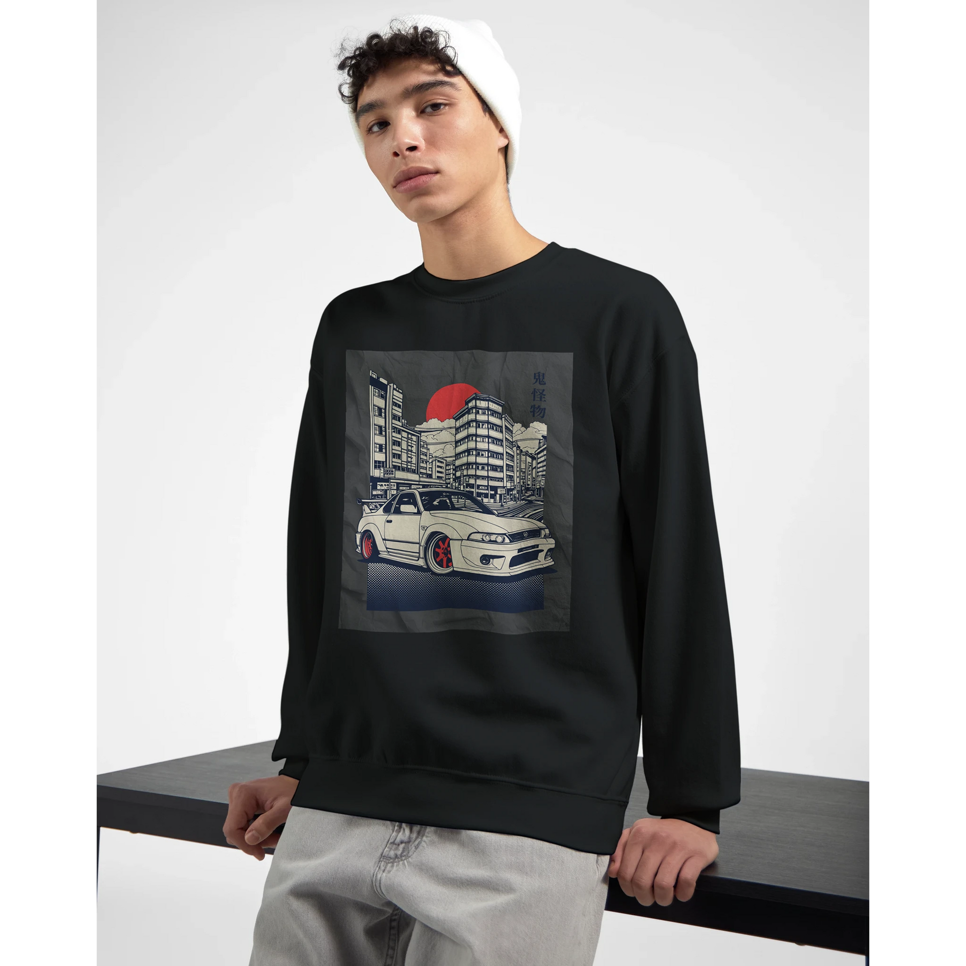 Model wearing black Car Jumper JDM Sweatshirt with cityscape and white car graphic; soft cotton-poly blend.