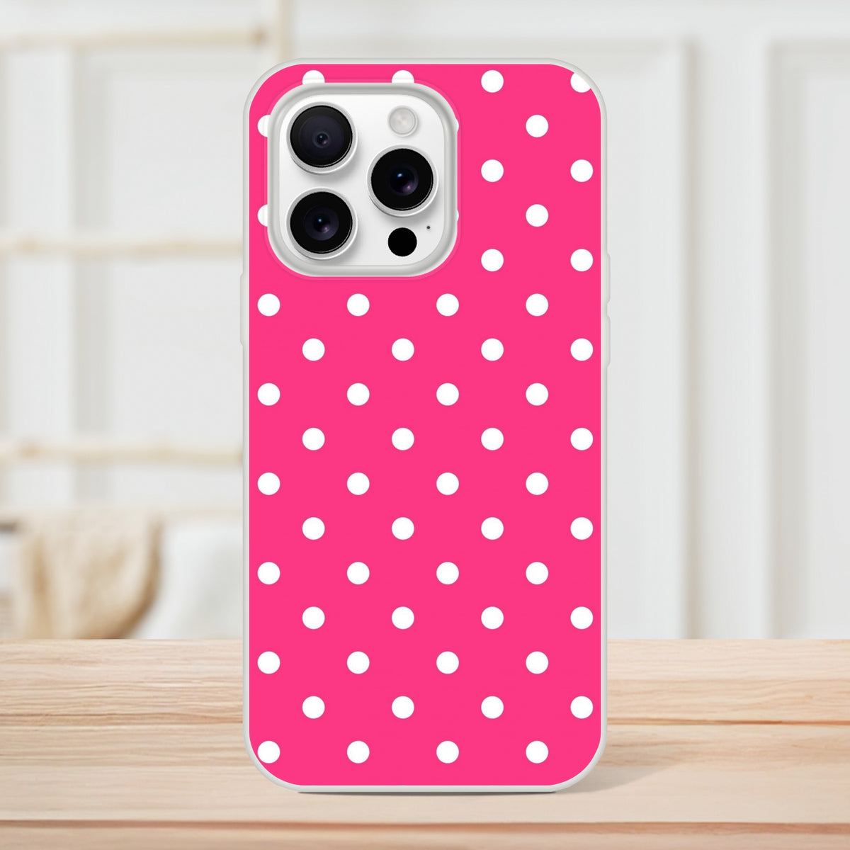 Hot pink and white polka dot retro iPhone case with matte finish and shock-absorbing TPU shell for models 13-16.