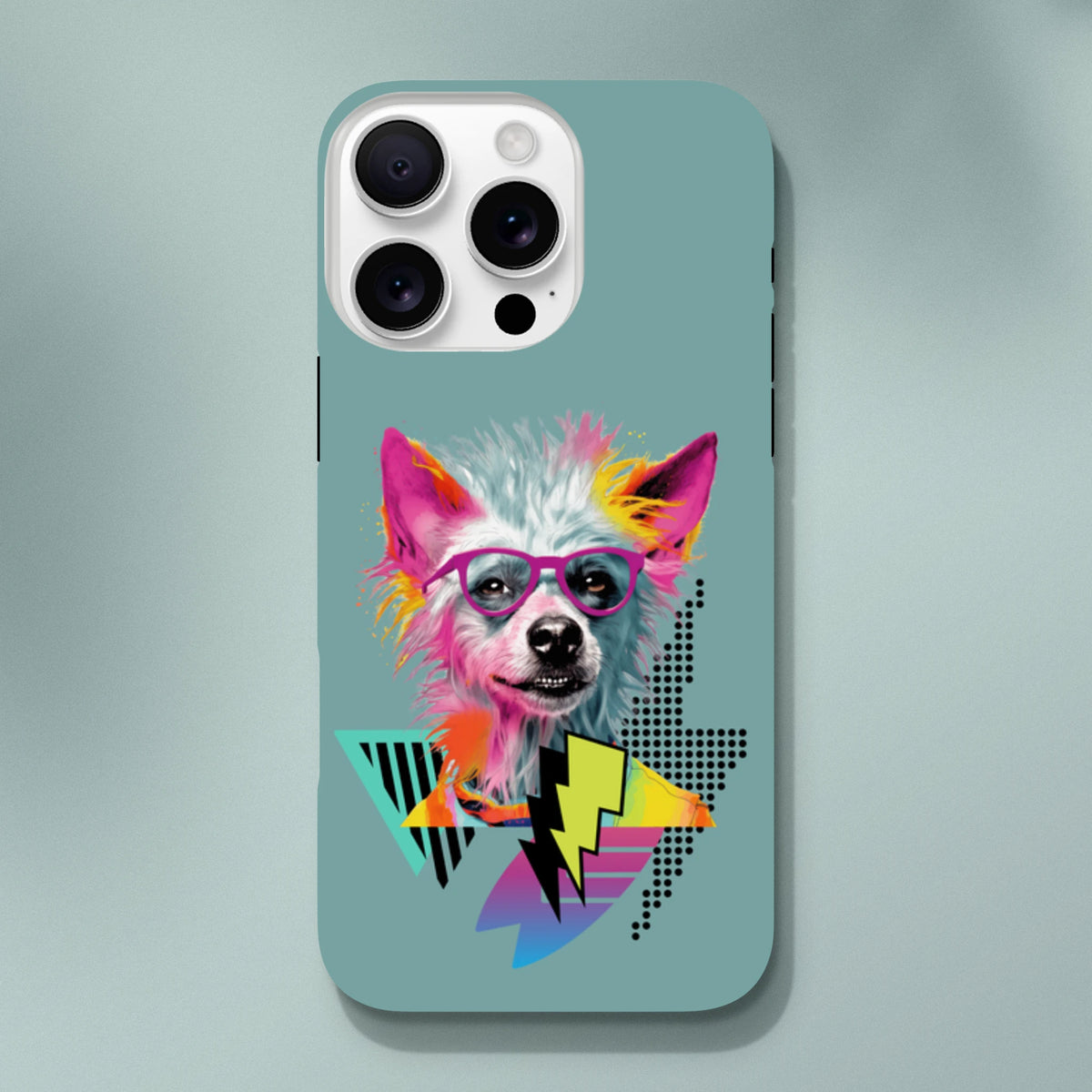 Vibrant pop art dog wearing glasses on a teal iPhone case. Features colorful geometric shapes and lightning bolts for a bold, retro street style look.