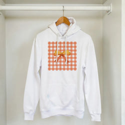 White pullover hoodie featuring an orange gingham square print with a central yellow bow for a cute coquette aesthetic streetwear look.