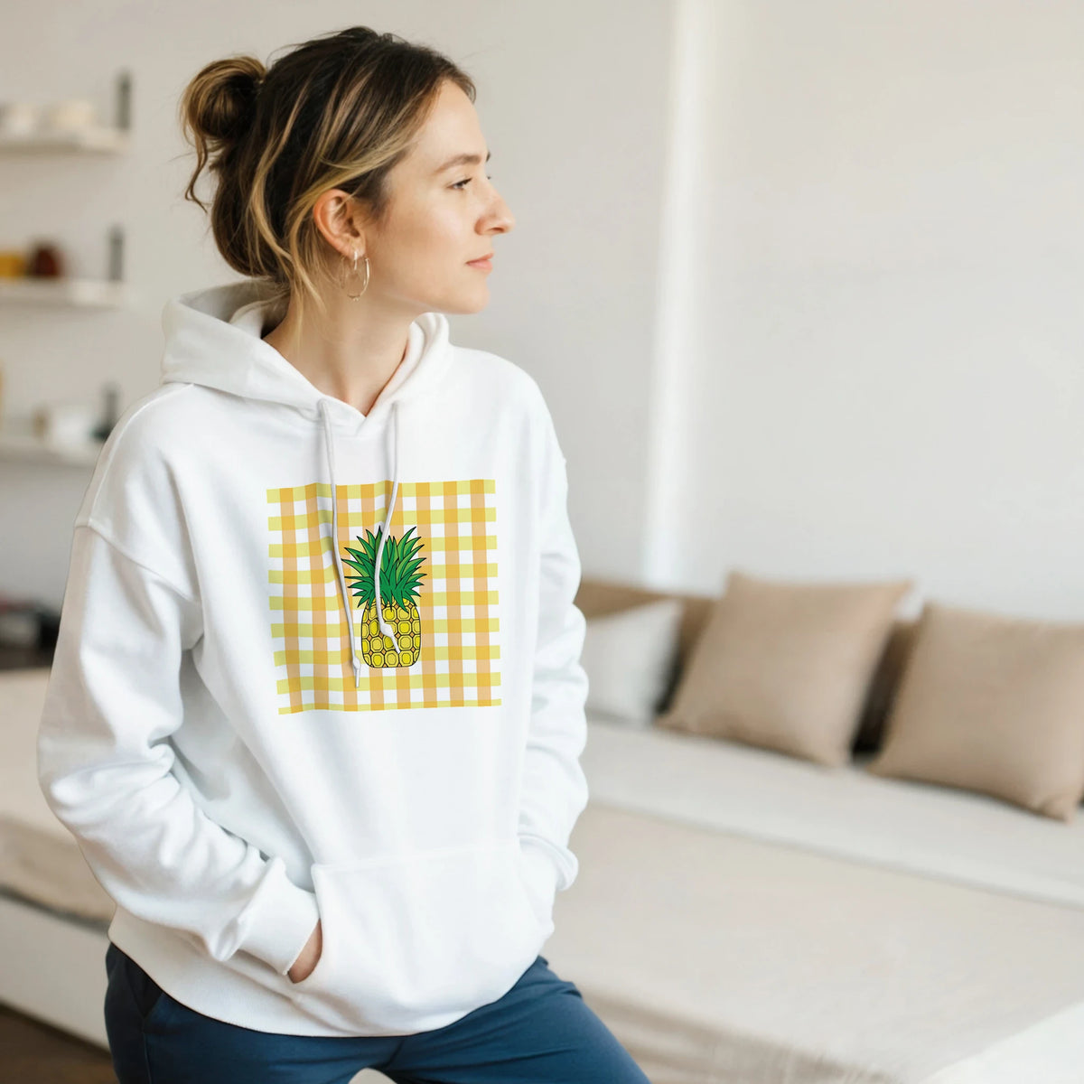 White hoodie featuring a retro yellow gingham pineapple graphic, styled as a vintage fruit pullover for women.