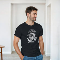 Man models Gothic Glory graphic T-shirt in black with a statue motif and ornate circular design.