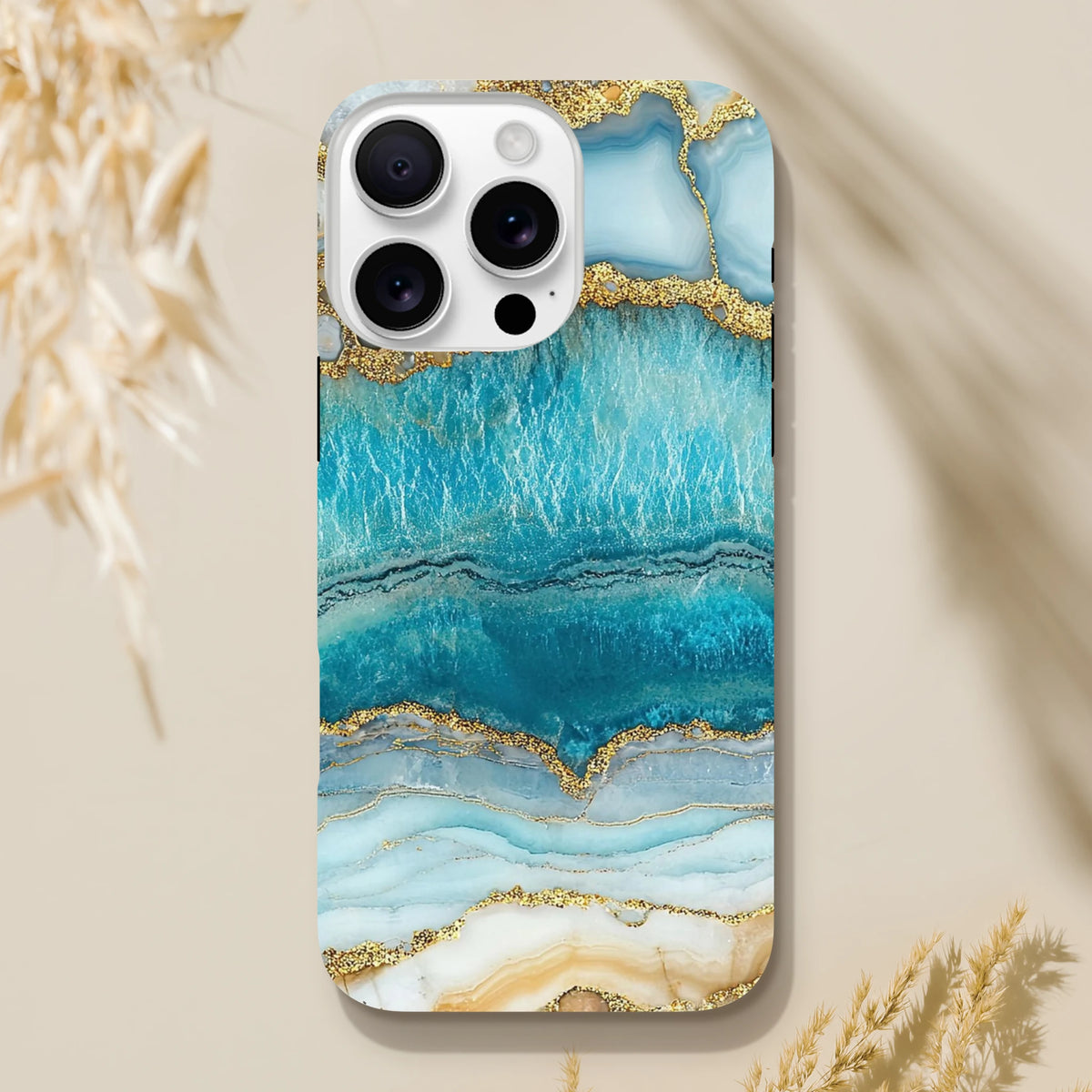 Blue Agate iPhone 13-16 tough case featuring a teal and gold marble design with glittery accents for urban style.