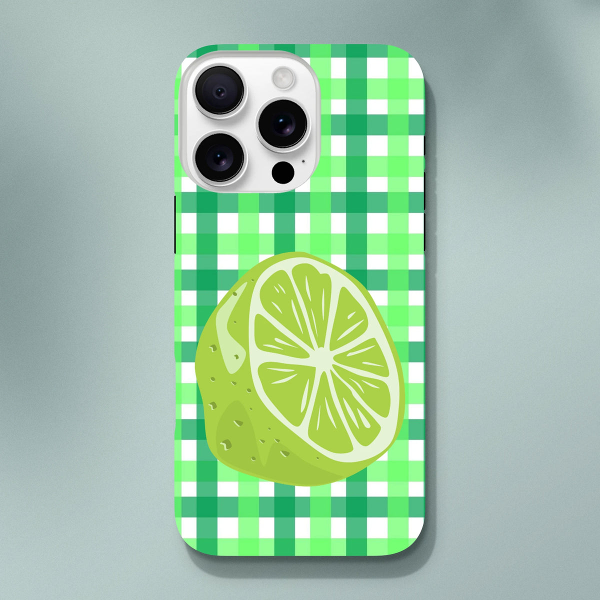 Lime gingham iPhone case featuring a large citrus slice illustration on a green and white checkered pattern background.