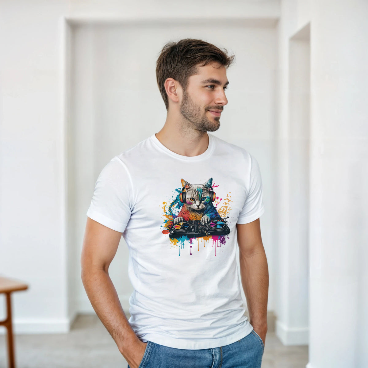 White men's t-shirt featuring a colorful graphic of a cat wearing headphones and DJing with vibrant paint splashes.