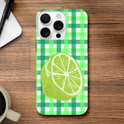 Lime green gingham iPhone case featuring a large citrus slice illustration for shock-absorbing protection and daily reliability.