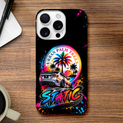 Static Slammed iPhone case featuring a modified silver car, rainbow palm trees, and "Urban Palm Trees" text against a black splatter background.