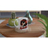 Retro Girl mug featuring a red-haired woman in sunglasses with a lollipop on white ceramic.