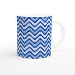Retro blue wavy stripe ceramic coffee mug with geometric zigzag pattern, ideal for daily drink.