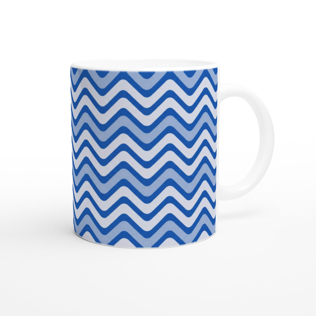 Retro blue wavy stripe ceramic coffee mug with geometric zigzag pattern, ideal for daily drink.
