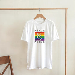White Pride LGBTQ graphic T-shirt on hanger with rainbow flag and Peace & Pride text