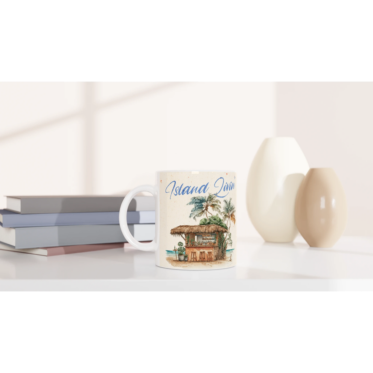 Retro postcard mug with island-themed artwork, white ceramic coffee cup on a clean desk.