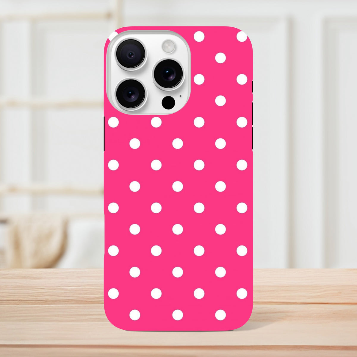 Hot pink & white polka dot tough iPhone case with shock-absorbing TPU and dual-layer protection for iPhone 13-16.