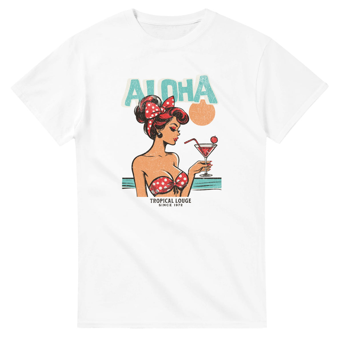 Aloha graphic T-shirt on white tee with retro pin-up woman, teal ALOHA text, red polka-dot bikini, sipping a cocktail.