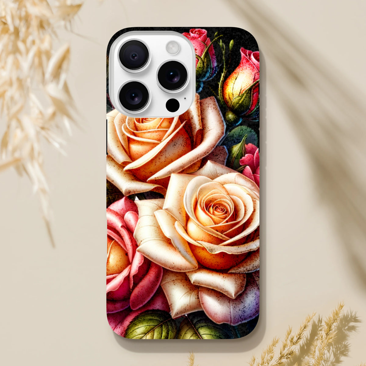 Romantic floral iPhone case featuring vibrant peach and pink roses with reinforced corners for durable protection.