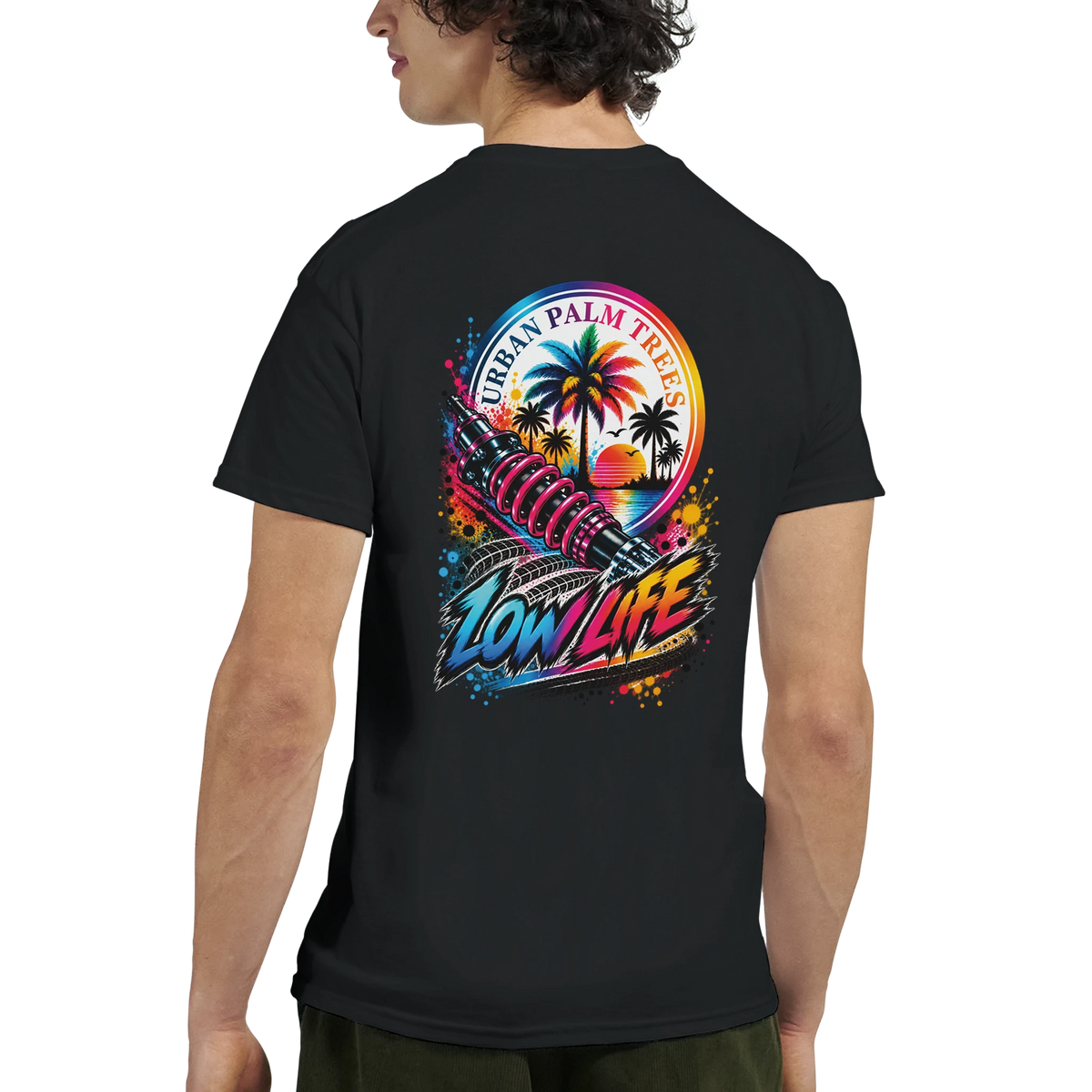Black Low Life Petrolhead graphic tee featuring a shock absorber, palm trees, and "Urban Palm Trees" sunset design on the back.