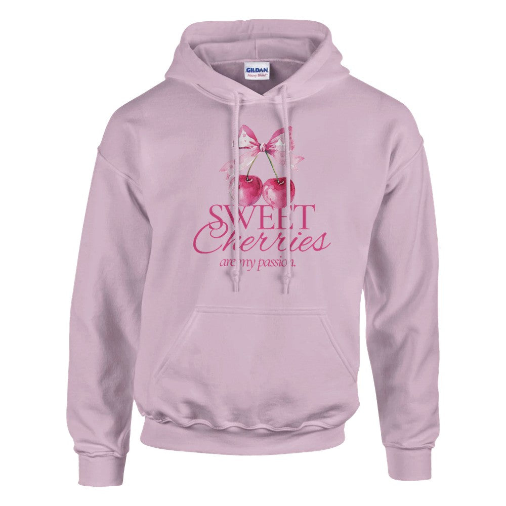 Women's pink cherries hoodie in a soft cotton-blend with cherry graphic and pink cursive text.