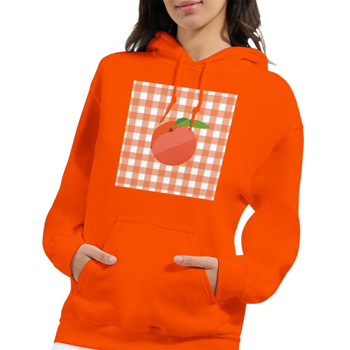 Orange hoodie featuring a retro peach graphic on a gingham background. Vintage fruit pullover for streetwear.
