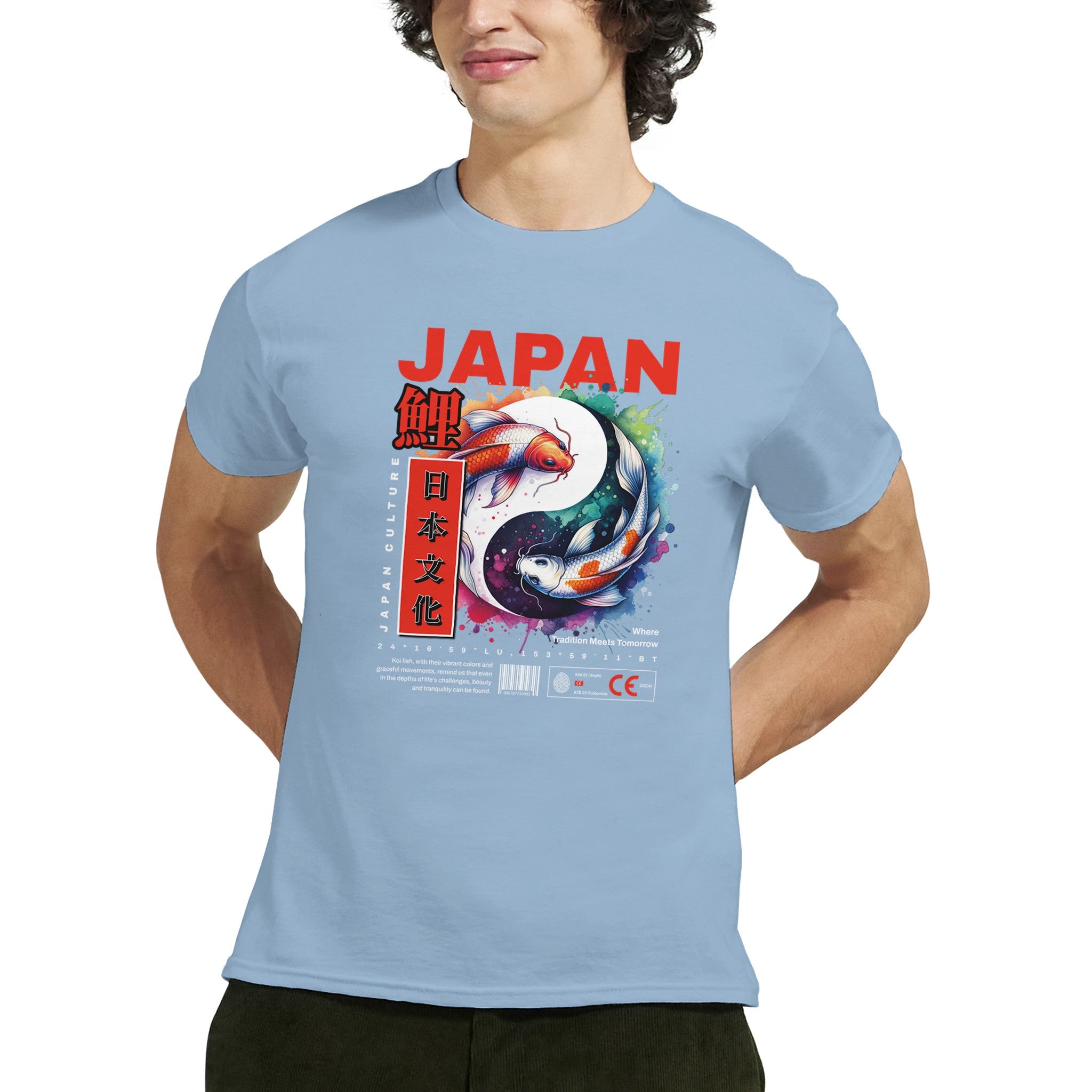 Japanese men's graphic T-shirt in light blue featuring koi fish artwork and bold JAPAN typography.