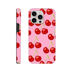 Pink iPhone case featuring a red cherry pattern with green stems on a vibrant pink background, offering bold street-ready style.