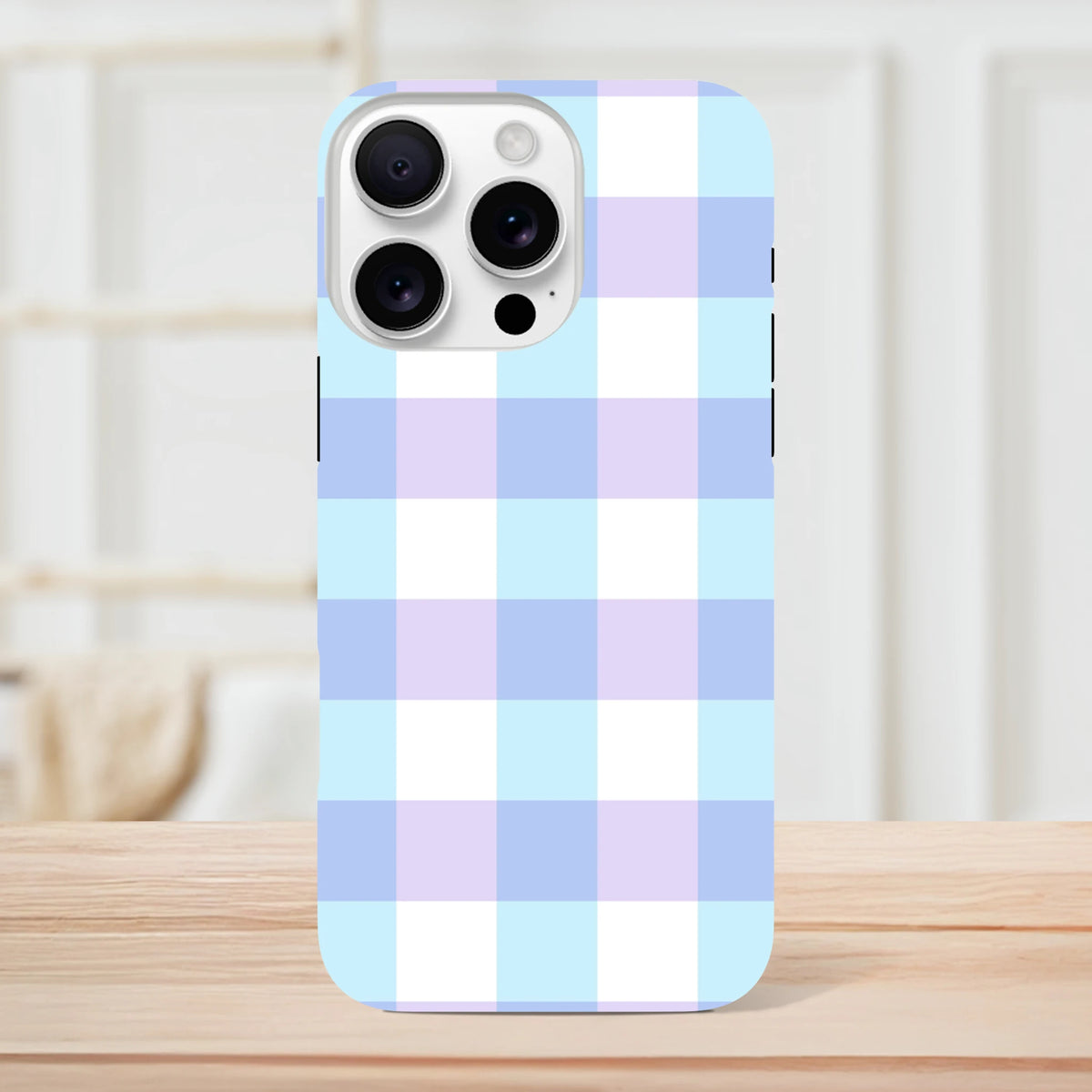 Pastel blue and lavender gingham tough iPhone case with cute checkered pattern for shock absorption.
