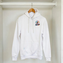 White streetwear hoodie with colorful "Full Send" palm tree graphic on chest, hanging in a closet.