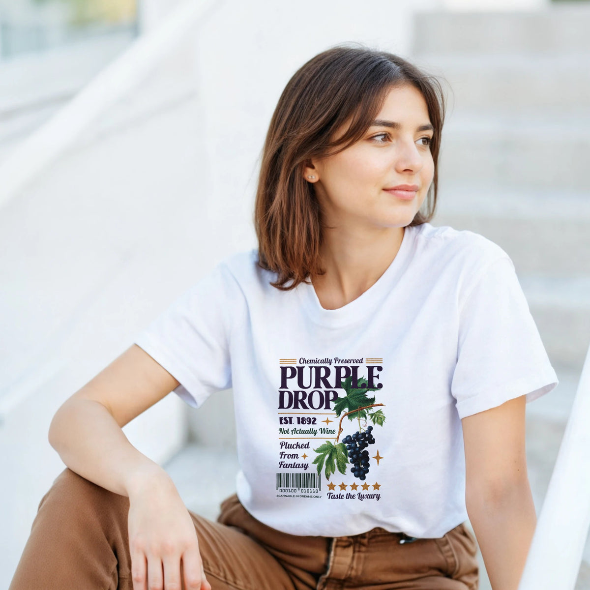 Grapes women's graphic T-shirt in white cotton blend with grape cluster print.
