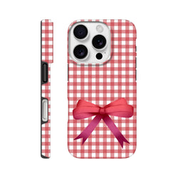 Red gingham iPhone case with a bold pink bow featuring a coquette aesthetic and tough protective design for iOS 13-16 devices.