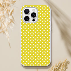 Retro yellow iPhone case with white polka dots and slim TPU protection for iPhone 13 through 16.