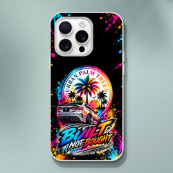 iPhone case featuring a silver modified car, rainbow palm trees, and "Built Not Bought" text against a colorful paint splash background.