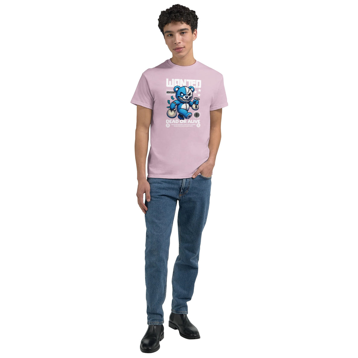 Man wearing pink Teddy Bear graphic T-shirt with blue bear design, crew neck, paired with blue jeans and black boots.