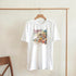 White Tequila graphic T-shirt for women with tropical beach scene, soft cotton blend, crew neck.