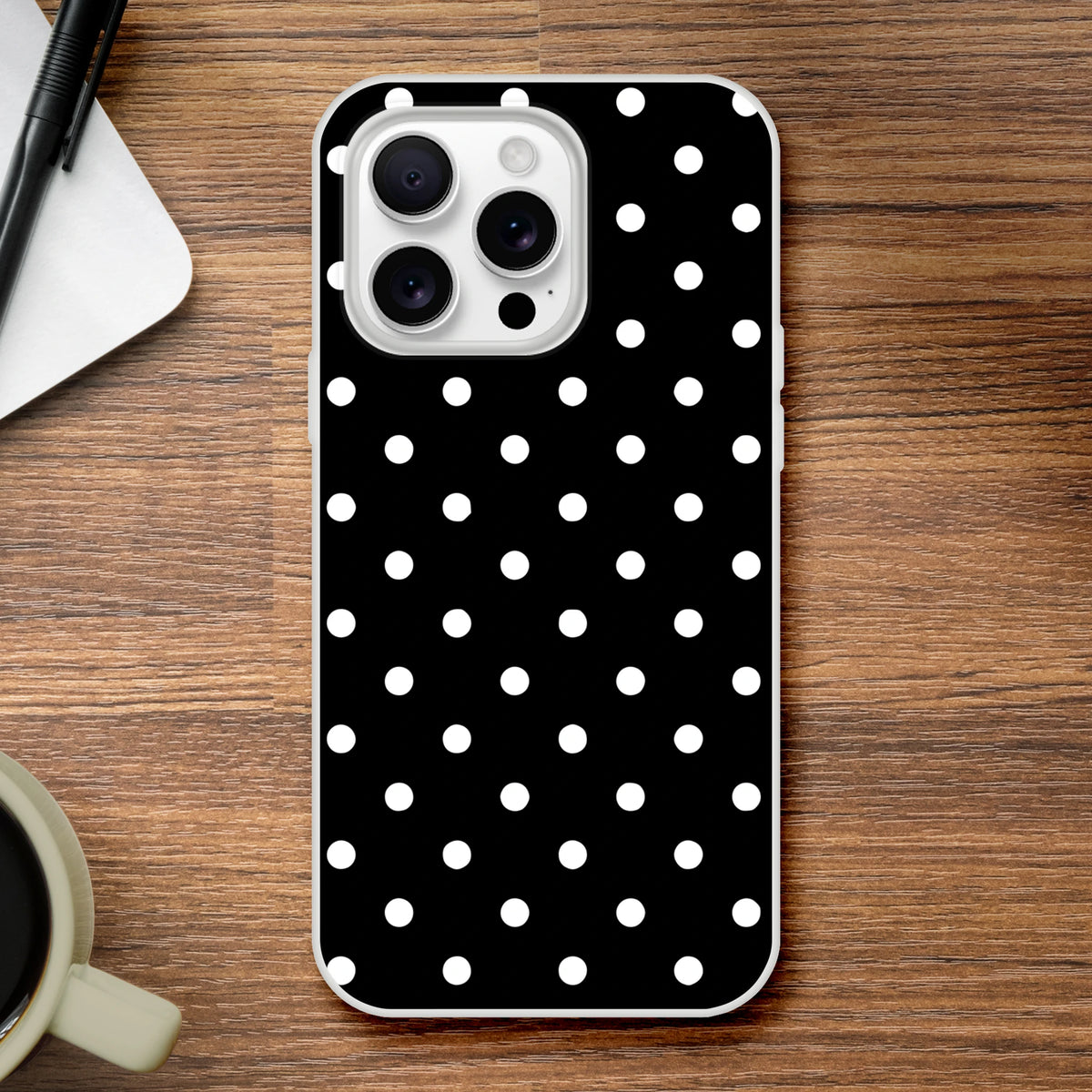 Retro black and white polka dot iPhone case. Slim matte TPU shell offers drop protection and wireless charging for iPhone 13-16.
