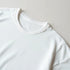 White Hustle men's T-shirt close-up; soft cotton-blend fabric.