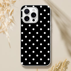 Retro black and white polka dot iPhone case with slim matte TPU protection and wireless charging compatibility for models 13-16.